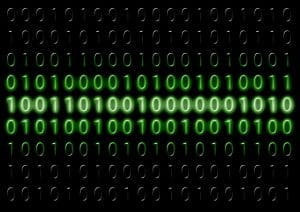 En computersk?rm fyldt med nuller og ettaller.