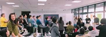 An image showing a meeting inside the Genesis Gaming office.