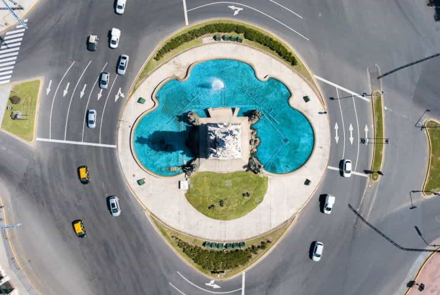 Cars swirl around Buenos Aires’s famous Obelisco monument.