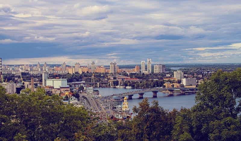 A panorama of Ukraine’s capital and largest city, Kiev, with numerous high rises and bridges in sight.